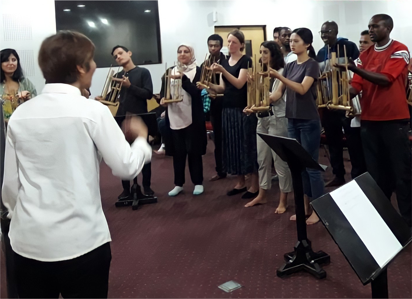 International students of Yogyakarta State University learn to play angklung which is one of the cultures in Indonesia